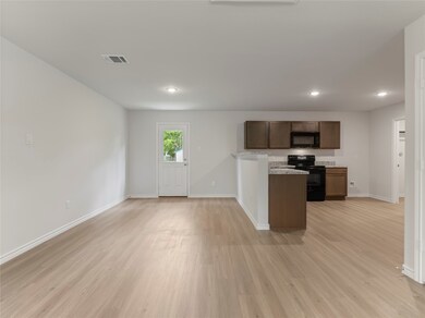 Spacious dining area seamlessly connected to the k