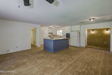 Living Room 3 and Kitchen