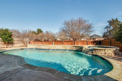 View of swimming pool featuring a fenced backyard 