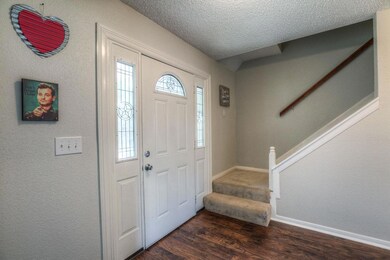 Beautiful entry way.  Beautiful LAMINATE FLOORING is throughout most of the MAIN FLOOR.