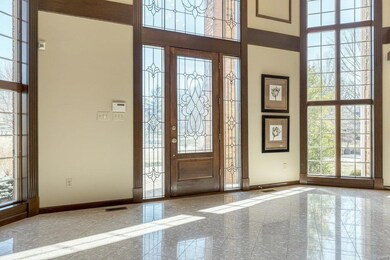 An impressive 2 story foyer welcomes you home!  So many windows in this home makes it bright even on a cloudy day!