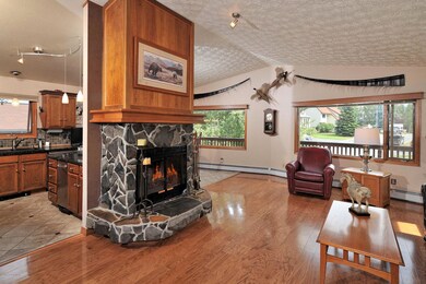 Living Room w/ Rock Fireplace