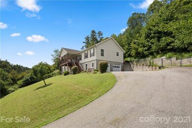 2 CAR GARAGE + AMPLE DRIVEWAY PARKING