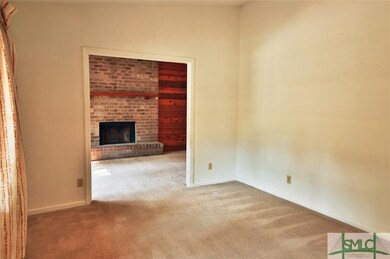 LIVING ROOM APPROACHING GRAND DEN