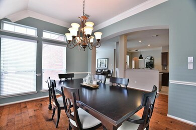 While dining, you can enjoy lots of light and a view of the back yard and pool.