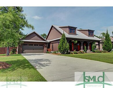 Exterior Front. Metal roof, detached 2 car garage