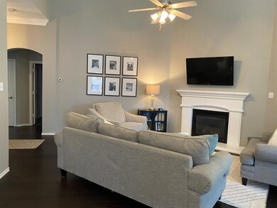Lovely living area with fireplace.