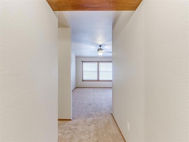 Hall looking into living area.