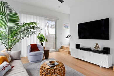 Living room featuring light wood-style floors