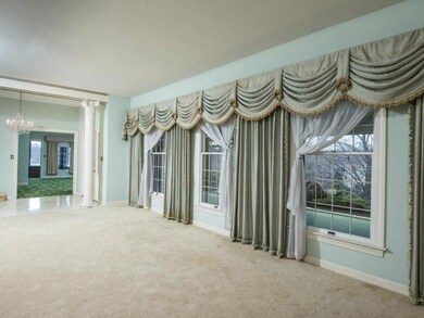 The large living room overlooks the...