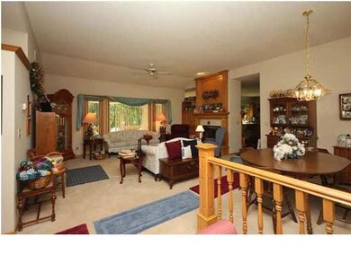 Enter into living room with 2 way fireplace, and l
