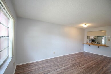Living room with an outside screened in porch (not