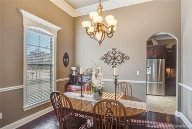 Formal Dining with hardwood flooring, and elegant 