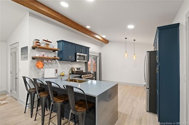Kitchen w/ breakfast bar!