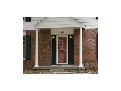 A covered porch greets your visitors