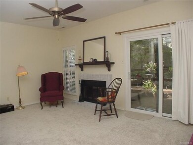 Living room has 9' ceiling, gas log FP, new vinyl 