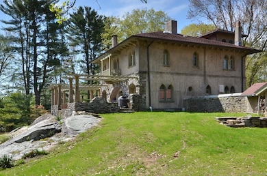 Situated on a hilltop overlooking the property