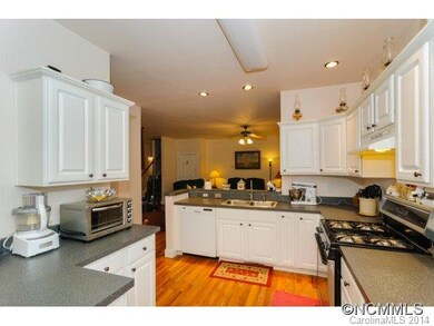 Open to living room & dining