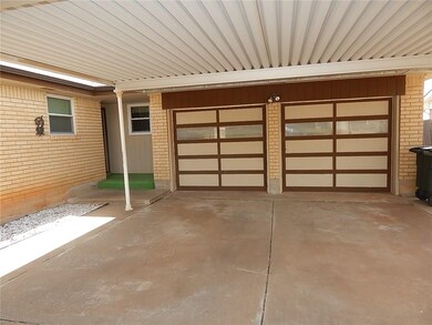 Nice double car driveway and covered parking!