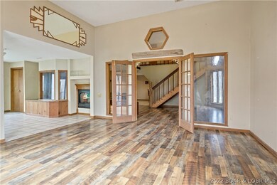 foyer area with two way fireplace