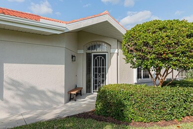 Property entrance with stucco siding