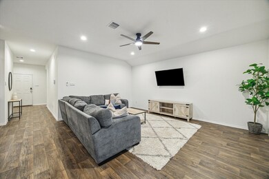 Expansive living area featuring high ceilings and