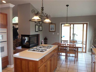 Kitchen. Spotless Open Kitchen With Fireplace & Sl