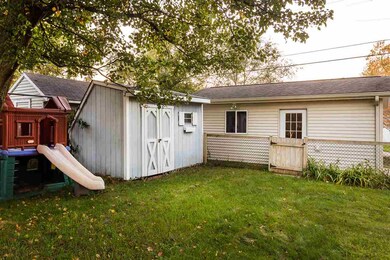1 car detached garage, playhouse and garden shed!