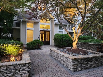 Entrance to property with stucco siding and french doors