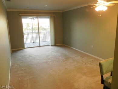 View of spacious living/ dining room from hallway.