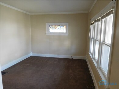 Family Room, Hard Wood Floors Under Carpet