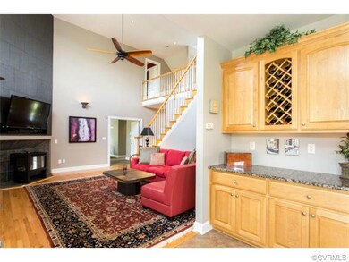Kitchen opening to Great Room showing additional s