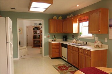 Large kitchen with window over the sink area. Refrigerator stays.