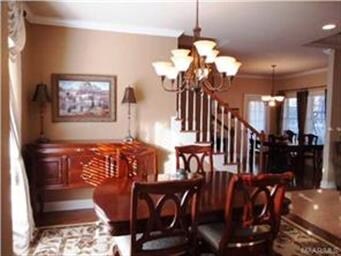 Love the open concept and the beautiful wood stair
