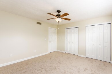 Master bedroom with double closets