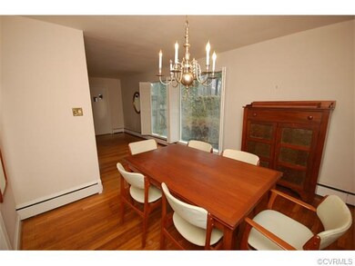 The dining room is adjacent to the kitchen.