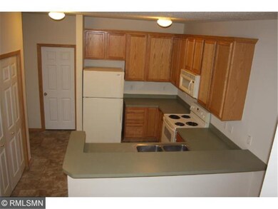 Kitchen has new flooring and attaches to 1/2 bath,