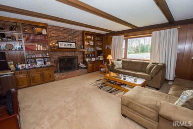 Family room open with Kitchen.  Fireplace and buil