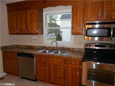 Kitchen - Kitchen features updated cabinets, 
