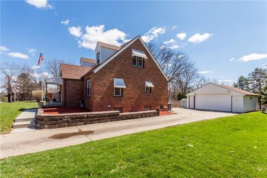 2 car detached garage and turn around space.