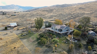 Views in every direction, separate well for irrigation, water rights certificate, and so many extras.