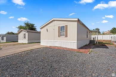 View of property exterior featuring driveway
