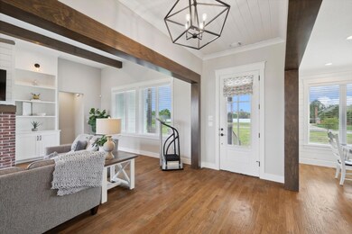 Nail down white oak wood floors and beautiful windows and lighting.