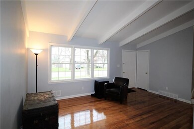 Living room with vaulted ceiling