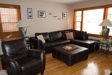 The living room offers an abundance of natural lig
