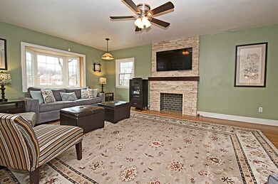 Living room with decorative fireplace