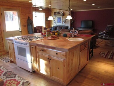 Kitchen island with prep sink.
