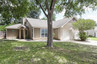 Ranch-style house featuring an attached garage, a