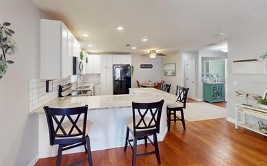 Granite counters with beautiful kitchen