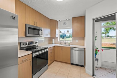 3871 Via Poinciana unit 1040, Lake Worth, FL 33467 - photo 6